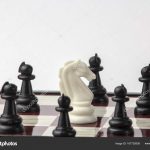 depositphotos_167720938-stock-photo-chess-white-horse-surrounded-by.jpg